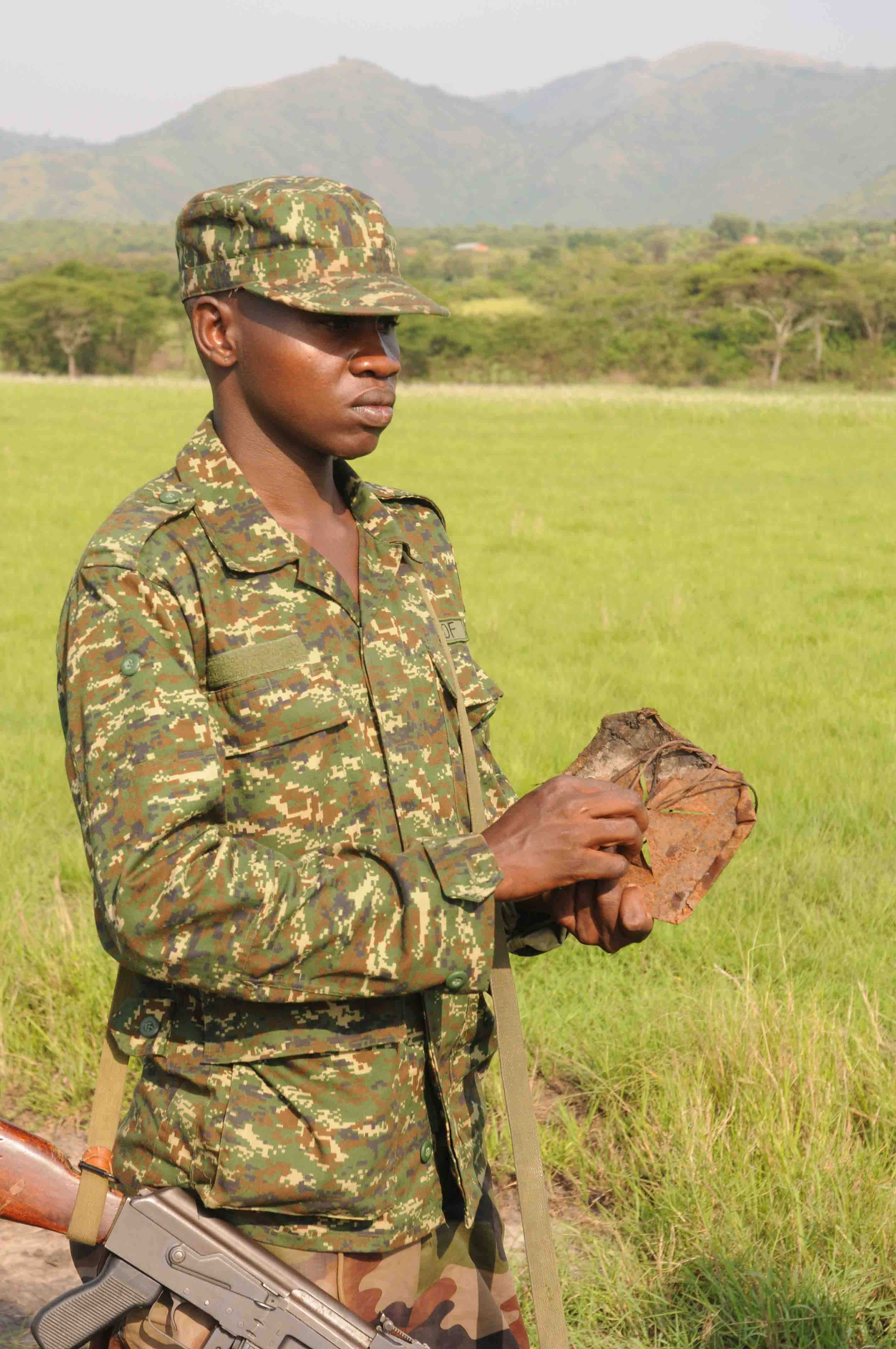Image: Ranger with snare (credit: Dr Andrew Plumptre, Wildlife Conservation Society)
